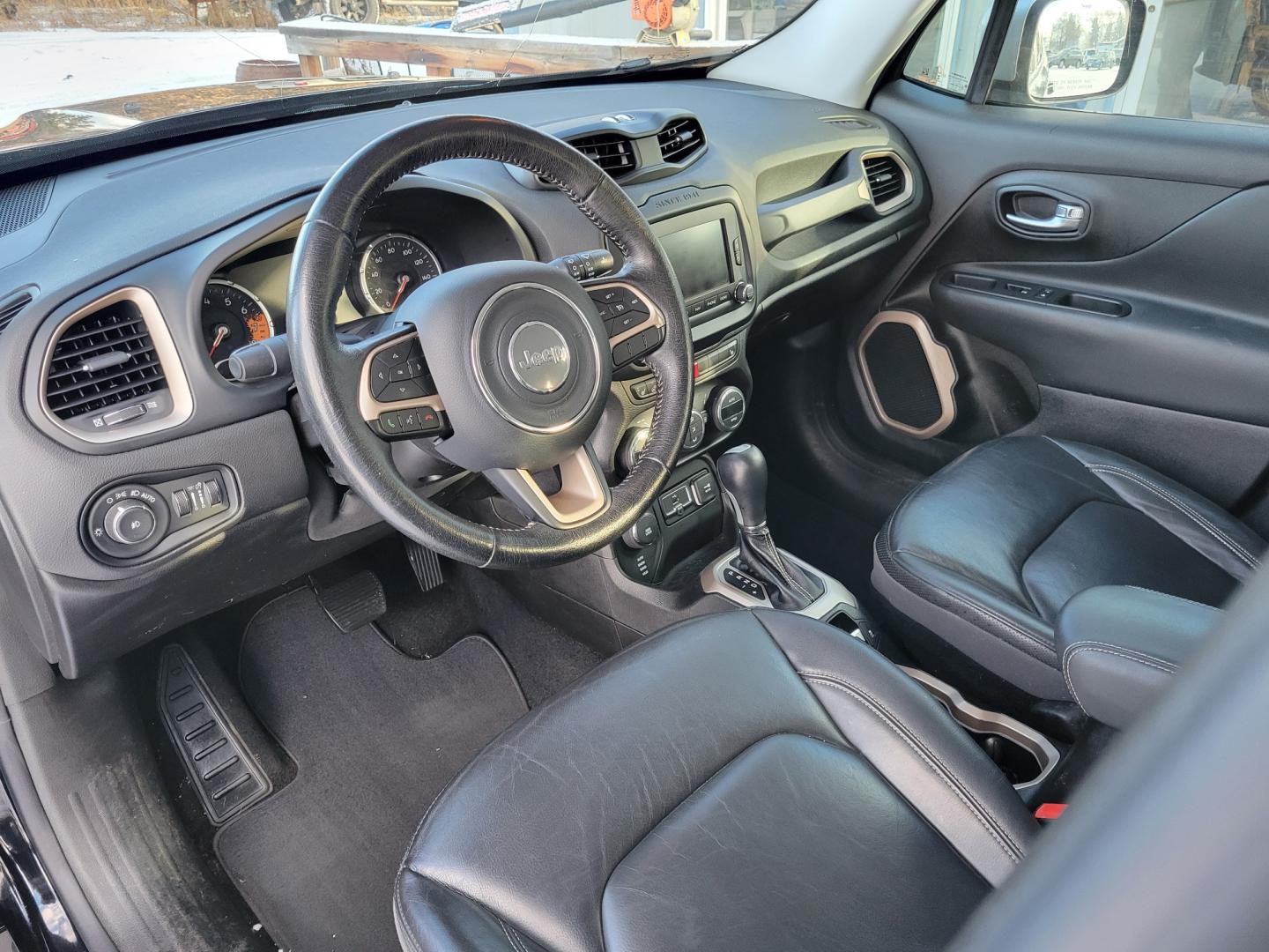 2015 Black /Black Jeep Renegade Limited (ZACCJBDT7FP) with an 2.4L I4 engine, 8 Speed Automatic transmission, located at 450 N Russell, Missoula, MT, 59801, (406) 543-6600, 46.874496, -114.017433 - 4 Wheel Drive. Automatic Transmission. Navigation. Heated Power Seats. Air. Cruise. Tilt. Backup Camera. AM FM XM. Bluetooth. Power Windows and Locks. Remote Start. - Photo#20